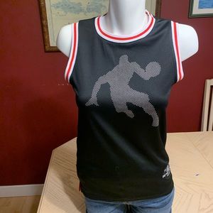 AND1, youth basketball shirt, never worn.
